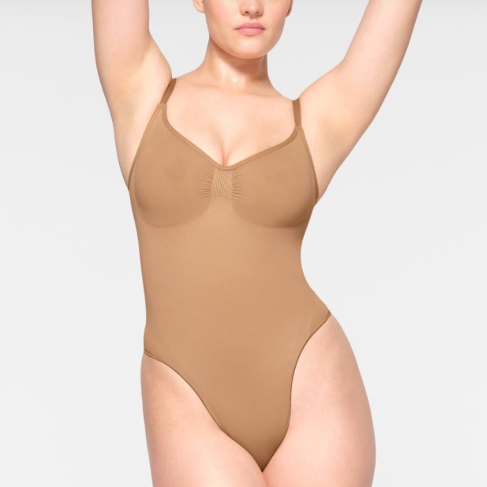 Skims Seamless Sculpting Thong Bodysuit in Orche